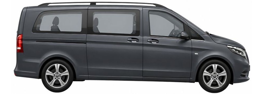 Grey 8-seater passenger van, side view